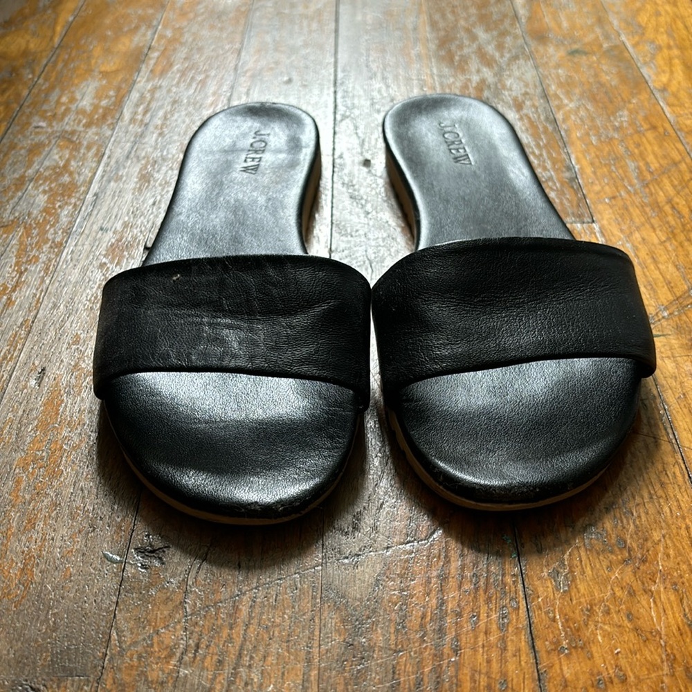 Black leather slides